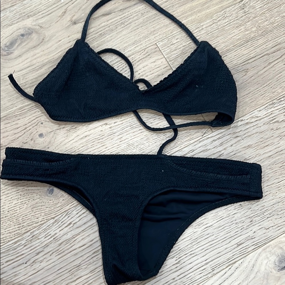 Black flattering large bikini fits like medium